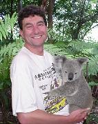 Rob with cheesy grin, koala looking unimpressed